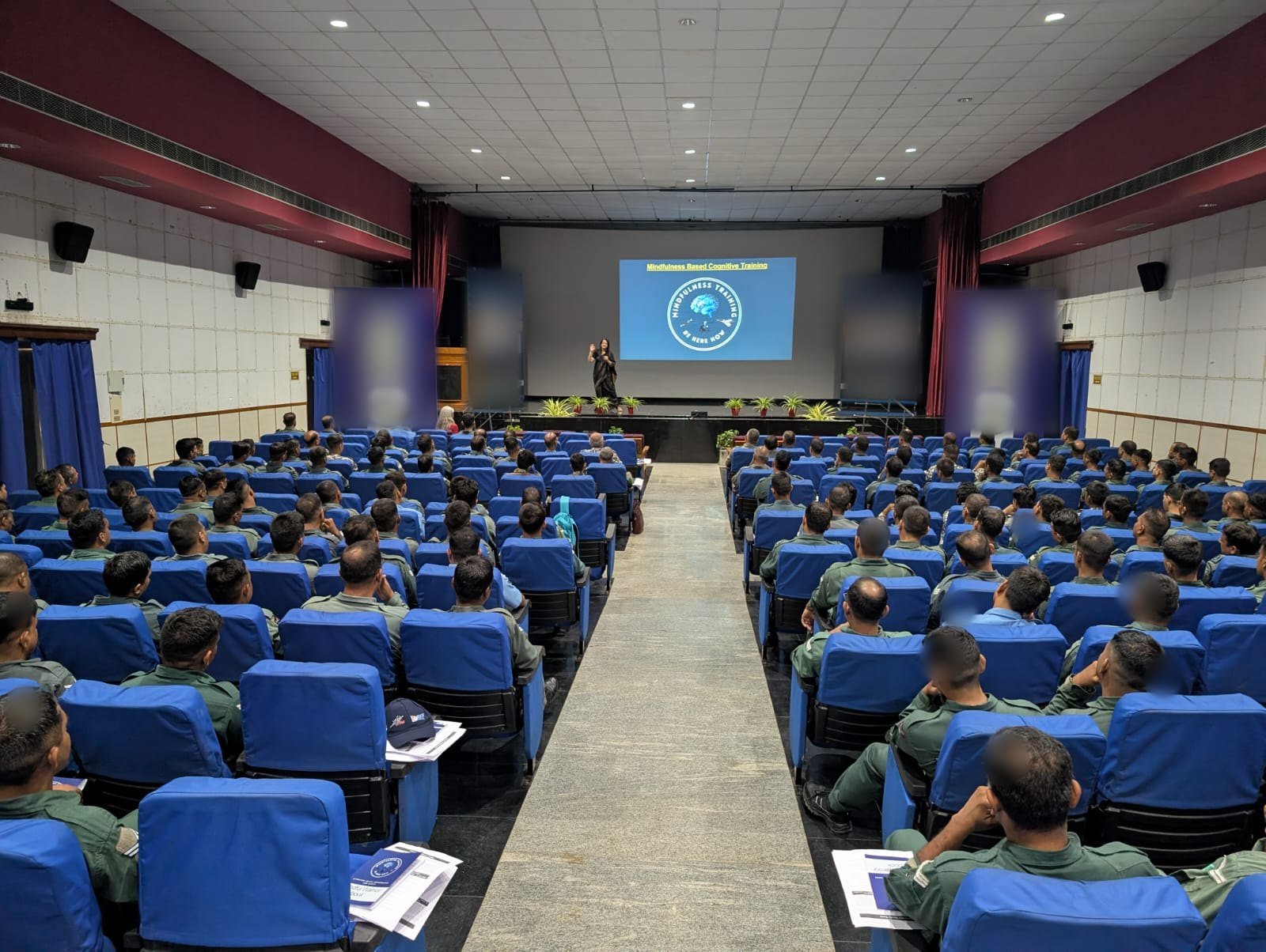 Shoba Shekar teaching a full auditorium of Air Force personnel