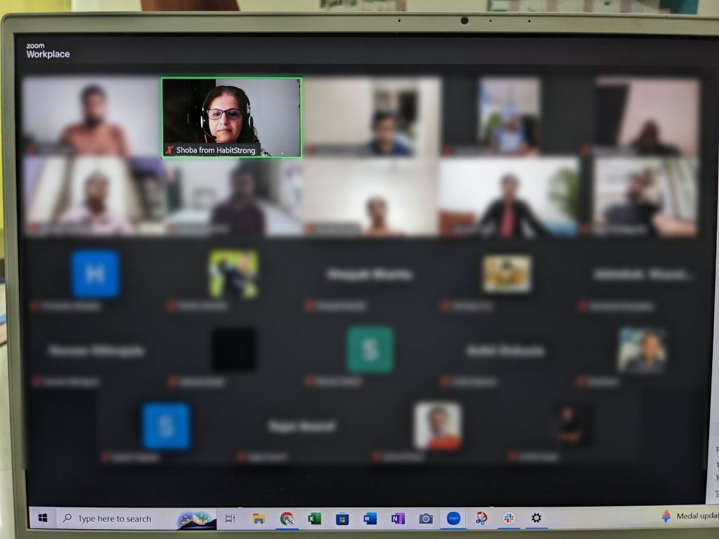 Shoba Shekar leading a live online morning session on Zoom, with participants blurred