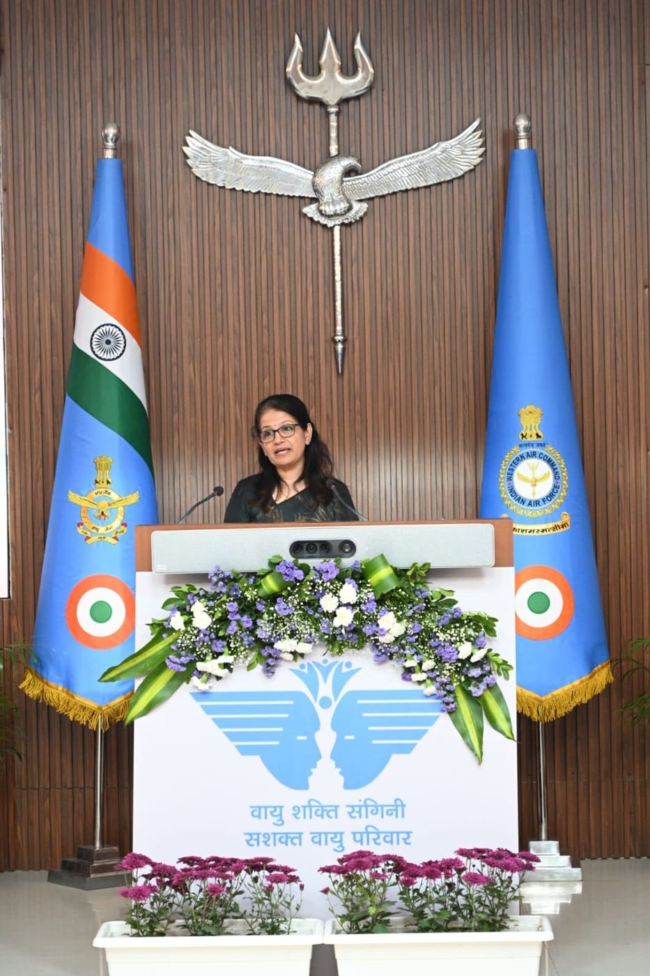 Shoba Shekar speaking at the podium, Indian Air Force